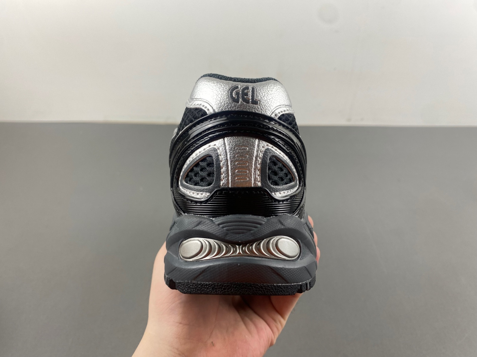 As*ic*s sneaker