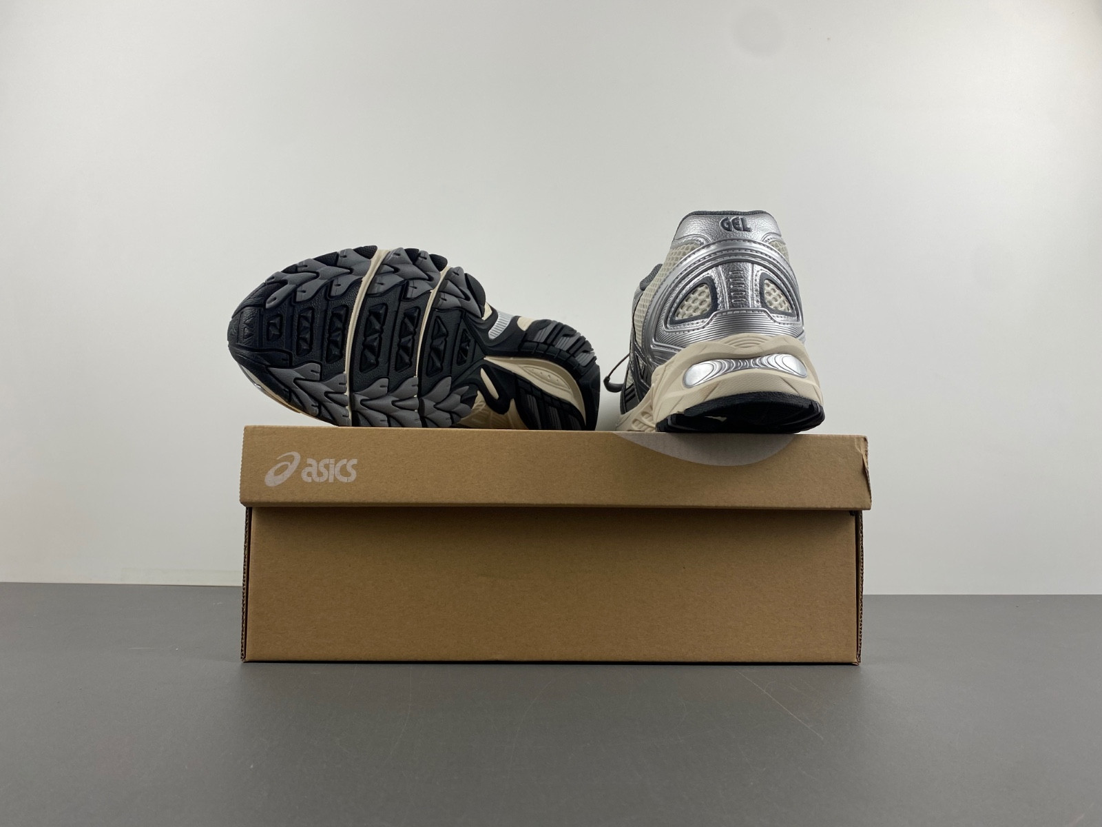 As*ic*s sneaker