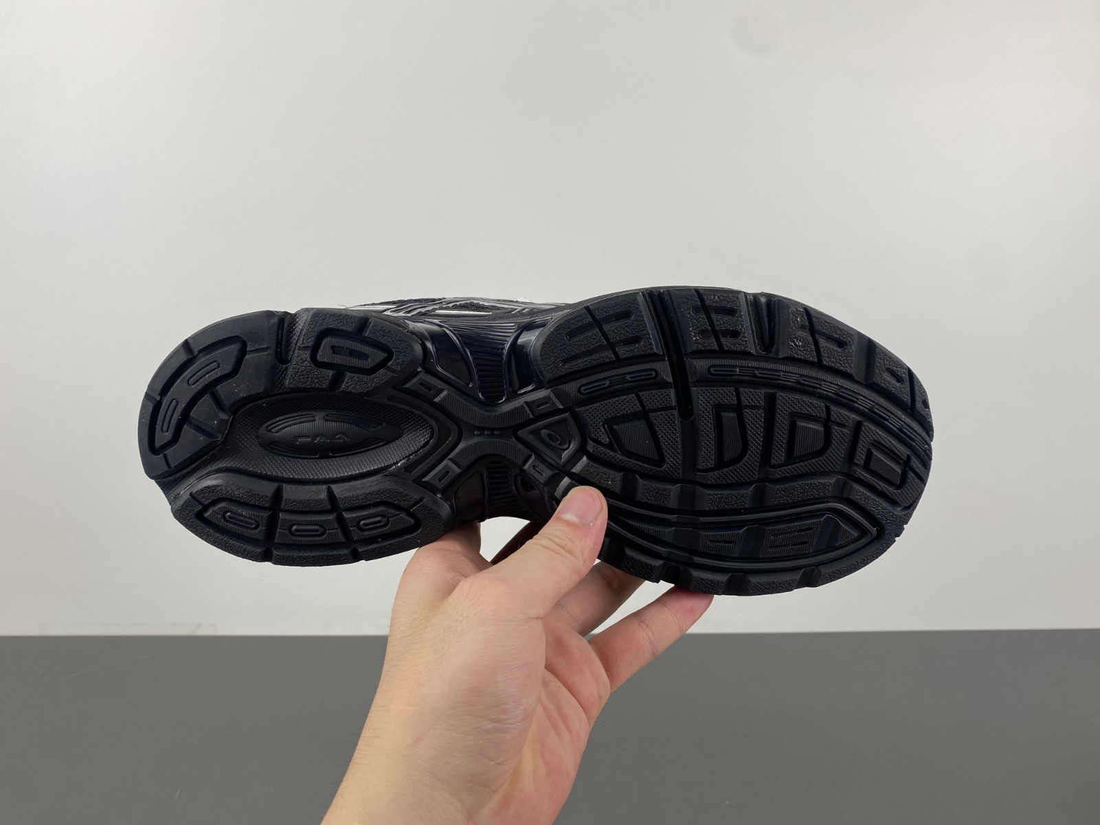 As*ic*s sneaker