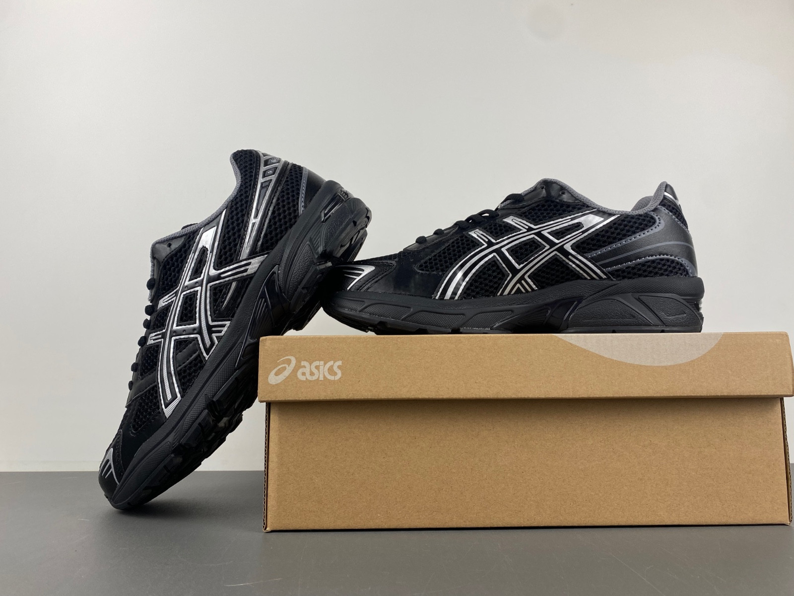 As*ic*s sneaker