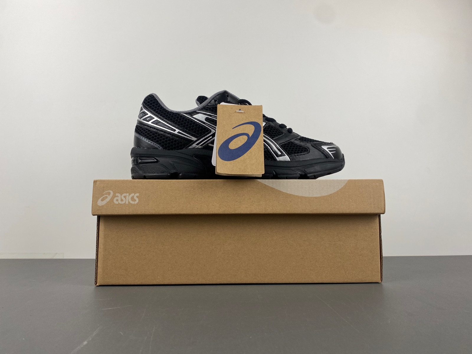 As*ic*s sneaker