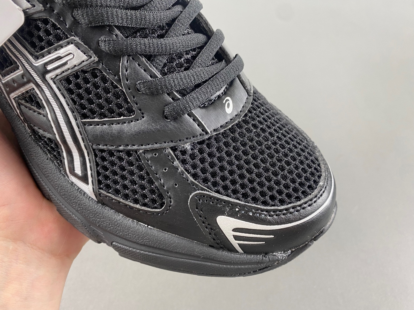 As*ic*s sneaker