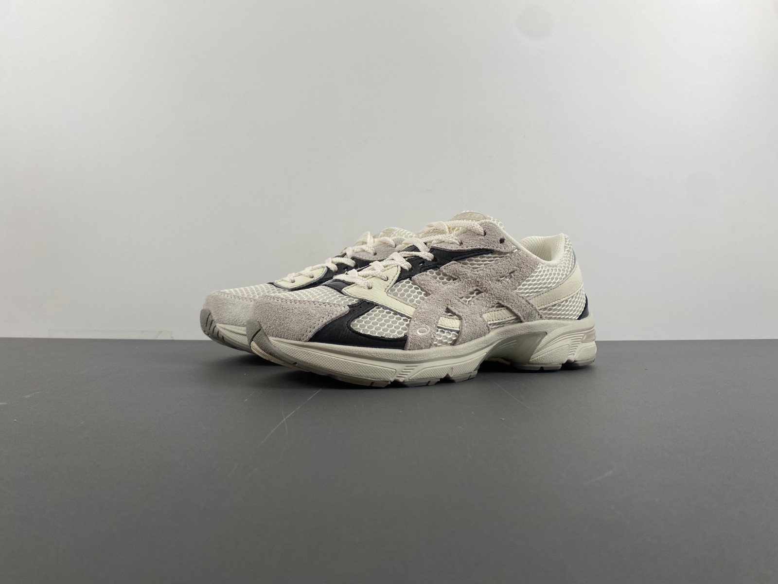 As*ic*s sneaker