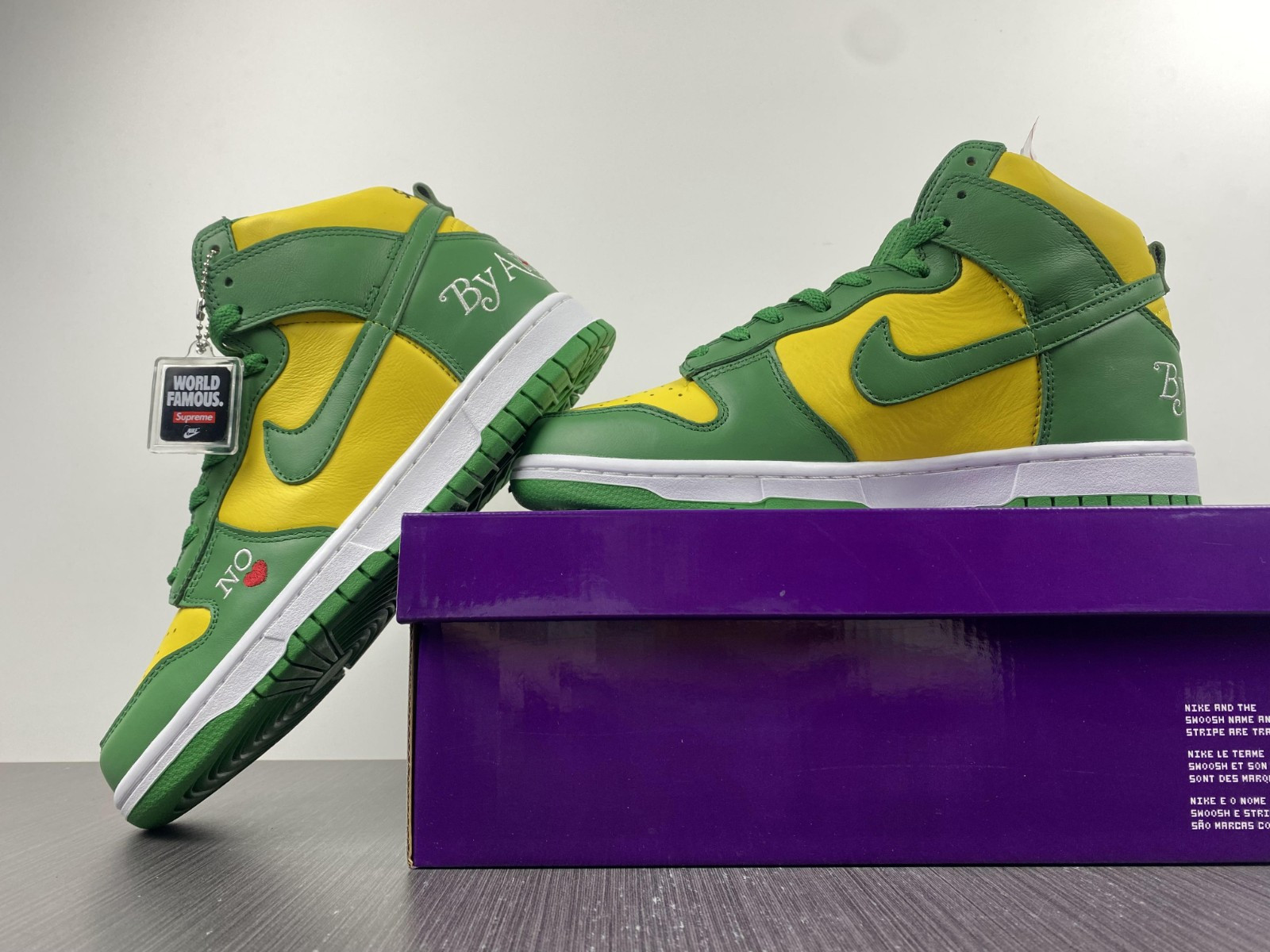 Supreme x Nike SB Dunk High “By Any Means” DN3741-700
